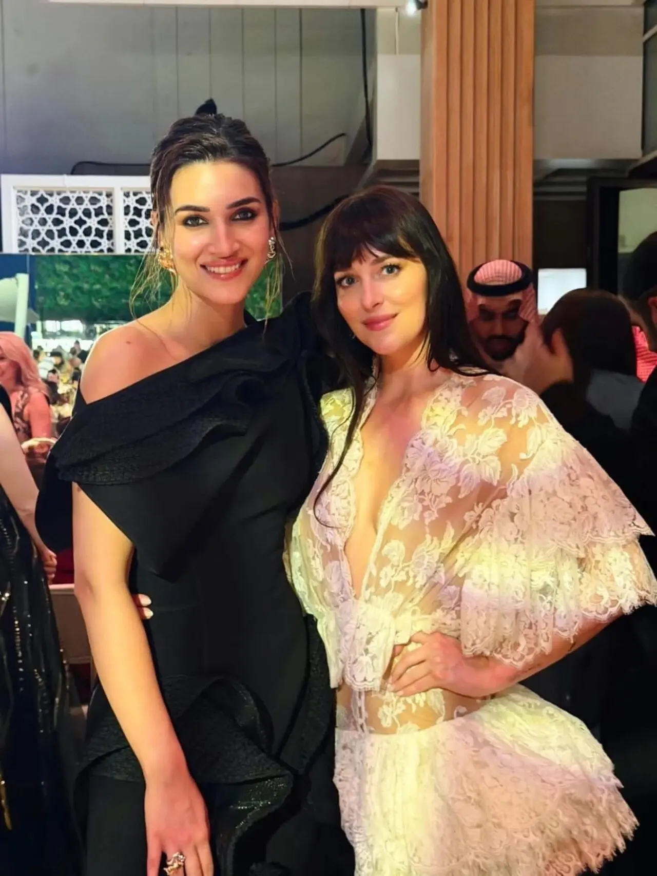 Kriti poses with Dakota Johnson at the Red Sea International Film Festival in Saudi Arabia